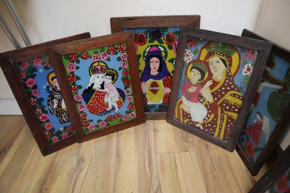 Continental School, eight reverse painted glass panels, Religious scenes, 38 x 29cm approx.